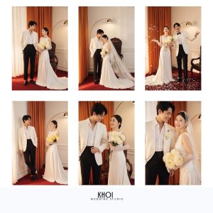 Cặp đôi trong bộ ảnh studio album sang trọng, diện váy cưới trắng tinh khôi và vest trắng thanh lịch, phong cách Hàn Quốc với tông màu ấm áp.